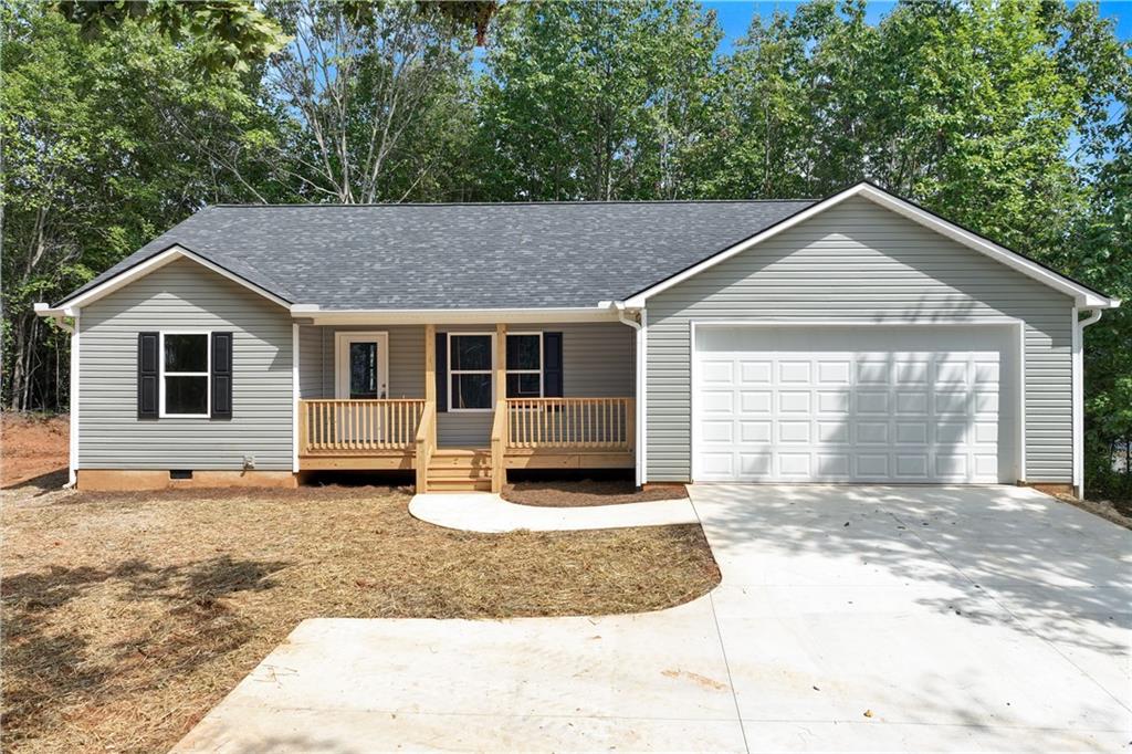 $5,000 Seller Paid Closing Cost! The Durham Plan - 3 Bedroom/2 Full Bathrooms home in the City of Mt. Airy, Georgia. The subdivision is conveniently accessible to I-985/365, Shopping, & Restaurants! Homes offers an Open Concept Living/Dining/Kitchen. Spacious Owner has en-suite Owner Bathroom and Walk-In Master Closet, Carpet in all Bedrooms. 2 Car Garage with automatic opener, Stainless Appliance Package, Granite in Kitchen, & MORE! This home offers GREAT outdoor living with a back patio plus large .52 acre lot!