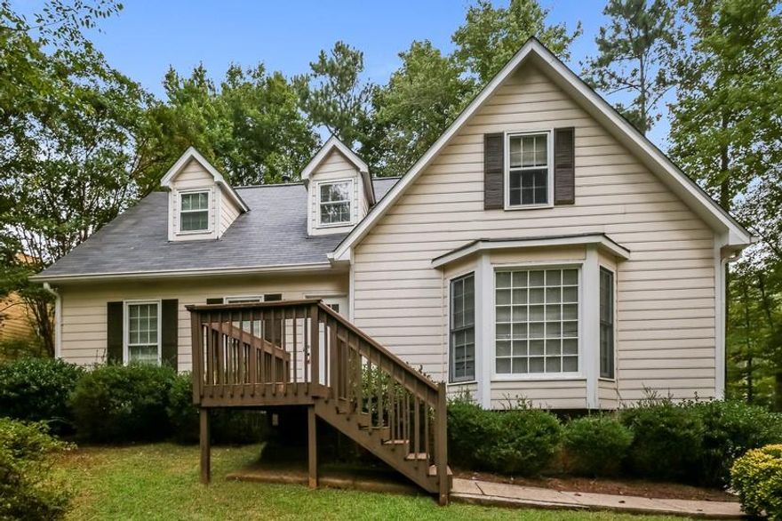 Tucked away in the sought-after East Cobb area, this spacious 4-bedroom, 2-bathroom home offers comfort, character, and the perfect setting for your next chapter. Previously leased and full of potential, this home sits on a beautiful, oversized wooded lot, offering privacy and a serene natural backdrop in an established, quiet neighborhood. Step inside to find an abundance of natural light, with a bright and welcoming layout that includes an eat-in kitchen featuring a large bay window—a perfect spot to enjoy your morning coffee while overlooking the trees. A functional floorplan provides a great foundation for your personal touches, while the unfinished basement provides an opportunity to expand your living space, create a home office, gym, or in-law suite—whatever suits your needs.