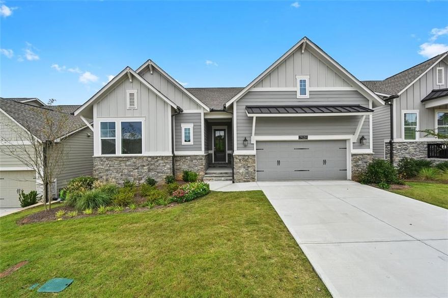 Like New Resale Home.  Step into a home that feels brand new—because it practically is. This immaculate resale property has never been lived in, offering all the benefits of new construction without the wait. Enjoy the privacy of both front and back sides, perfect for peaceful living. Inside, you’ll find no carpet—only elegant hardwood flooring throughout, creating a sleek and allergen-free environment. The garage and entire basement have been upgraded with fresh epoxy flooring, adding durability and a clean, modern finish.Relax and enjoy the private, wooded view from your covered rear deck, or fire up the grill as you entertain on your covered rear patio. Speaking of entertaining, wait until you see this open-concept Keyser Plan with the 12' sliding glass doors taking you out to the deck. The huge kitchen island features quartz countertops & the resident chef will love the 36" 5-burner gas cooktop, designer stainless steel vent hood and built in in microwave and oven. The large open study is perfect for a media room. THE RETREAT AT STERLING ON THE LAKE IS 55+ LIVING WITH ADDITIONAL PRIVATE EXCLUSIVE AMENITIES INCLUDING CLUBHOUSE, POOL, FITNESS CENTER, TENNIS/PICKLEBALL COURTS LAWN MAINTENANCE IS ALSO INCLUDED. This is a rare opportunity to own a pristine home in move-in-ready condition. Don’t miss your chance to make it yours!