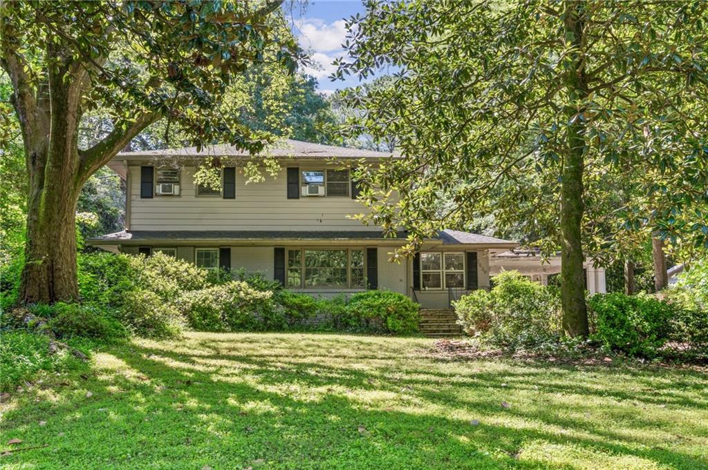 Charming 1950's Gem with Acre Lot across from Little Creek Riding Ranch! Step into timeless character and modern convenience with this beautifully updated 5-bedroom, 2-bath brick home nestled on a quiet street in a highly sought-after location. Featuring original hardwood floors and a thoughtfully remodeled kitchen, this two-story classic sits on a lush acre lot - perfect for gardening, relaxing or entertaining. Front yard is professionally landscaped and features old growth hardwoods.
Enjoy peaceful mornings on your spacious, partially covered patio or take in serene views of Little Creek Riding Ranch right across the street. Horses romp and play around the creek and pecan trees - what a sight. Inside, you will find a flexible floor plan with a main-level bedroom, separate dining room and a cozy bonus family room. Upstairs offers even more space wit ha large den or office area - ideal for remote work or creative pursuits.
With easy access to I-285 and just minutes from Downtown Decatur, Emory University and Stone Mountain Park, this location can't be beat for convenience, nature and lifestyle!