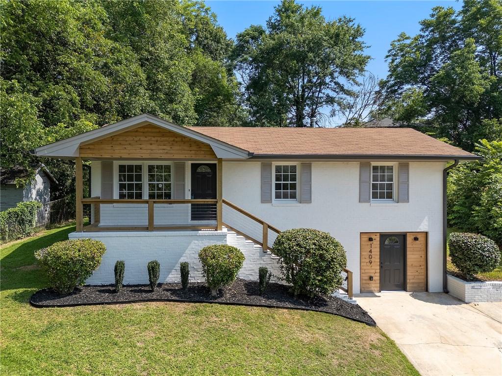 Welcome to this fully renovated gem in the heart of East Point! This beautifully updated home features 3 spacious bedrooms and a full bath on the main level, complemented by an open-concept layout with brand-new white cabinetry, luxury quartz countertops, stainless steel appliances, and all-new flooring throughout. The main bathroom showcases a tiled shower and a quartz-topped vanity, adding a modern touch. The fully finished basement includes another bedroom, a full bath, and a versatile bonus room that can serve as a living area, office, or additional bedroom, with its own private entrance—ideal for guests or rental potential. Enjoy worry-free living with new HVAC, plumbing, and updated electrical systems throughout. The freshly painted exterior and enormous backyard make this home perfect for summer gatherings, all just minutes from downtown East Point and within city limits. This property is a great fit for first-time homebuyers, house hackers, or investors exploring strategies like Airbnb or PadSplit. Ask us about down payment and closing cost incentives for up to $7,500 with our preferred lender!