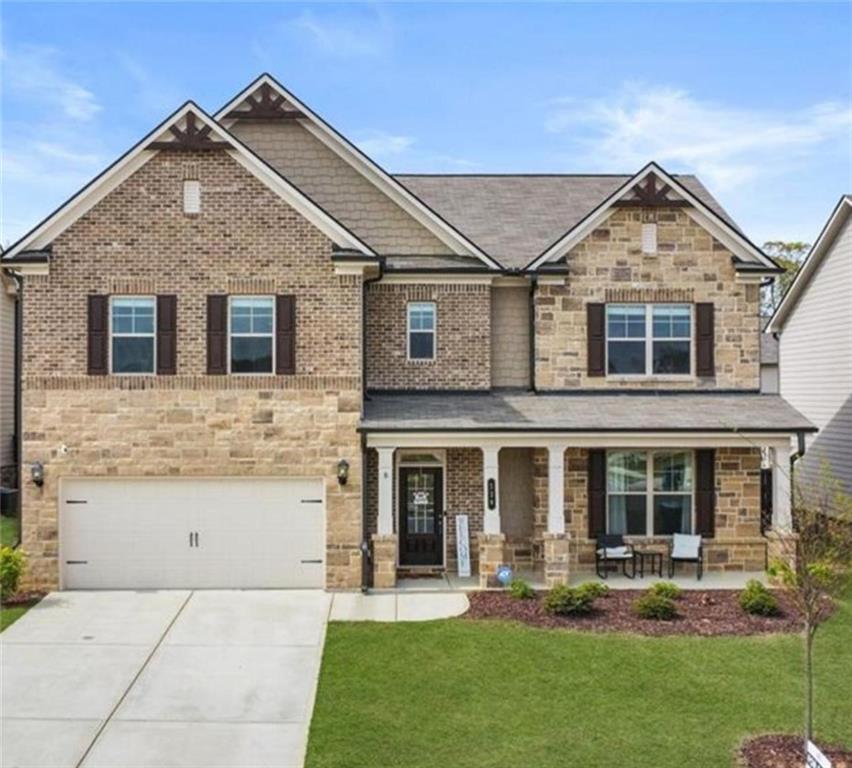 Do you desire to Rent a pristine home that is 4 years old and Fully Furnished ? You've found it! Open the glass paneled door and you're instantly welcomed with a wide and open foyer and divine LVP flooring on the entire home. Formal Dining room, Follow the glistening hardwoods to the warm and cozy family room which features a stone fireplace and offered high ceiling. The gourmet kitchen boasts an oversized granite island with under mount sink, pendant lights, ample 42" white cabinetry with crown molding, stone backsplash, and 5 burner gas stove! Foodies will absolutely adore the insanely large walk-in pantry which is literally the size of a bedroom and can hold all sorts of grains, legumes, packaged goods, and kitchenware. Let's not forget to mention that the stainless steel appliances such as the side by side refrigerator, built-in microwave, dishwasher, and oven are all included! Soaring 9 ft ceilings and a discreet mud room off the garage complete the main level of this dynamic home. A wrought iron spindle staircase leads you to the upper level where you will find more 9 ft ceilings and an impressively sized versatile loft that can be used as a playroom, media center, work studio.. the opportunities are endless! The huge owner's suite is tranquil and inviting with a trey ceiling and plenty of natural light. The owner's bath features a dual vanity with granite countertop, tile flooring, soaking tub and frame less walk-in shower. The owner suite's closet is massive and a must see! The three additional bedrooms are extraordinary in size and have access to a private bathroom with dual vanity. Enjoy the balmy Georgia weather in your grand screened-in patio with fireplace and ceiling fan! Step outside the patio into your humongous fenced in backyard where kids and pets can play safely and where you can grow any plants you desire! This beautiful abode has been meticulously cared for and it shows. Amazing amenities include a sparkling pool and playing field with gazebo! It's time to stop searching and come home to your future residence furnished and ready for your family.