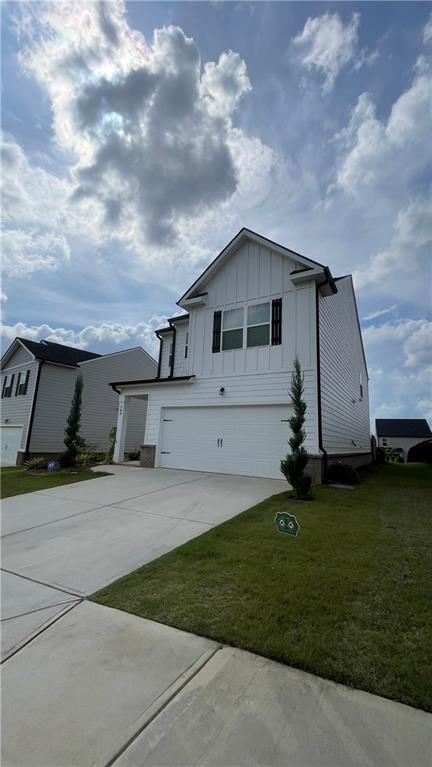 Come see what all the excitement is about at Twin Lakes' community with top-notch amenities! This beautiful 3 bedroom 2.5 bath home features an open concept main floor that is perfect for entertaining. All of the bedrooms and laundry room are on the second level. The master bedroom has everything you could want it features a walk in closet, dual sinks and a walk in shower. Two generously sized secondary bedrooms. Out back you will find a covered patio located just off of the eat in kitchen perfect for grilling! Twin Lakes' outstanding amenities include a pool, cabana, playground, dog park, nature trails, and waterfront fun by the lake! Plus, Twin Lakes is less than three miles from I-85 for easier commutes and connectivity to the northeast Atlanta area, convenient to historic, downtown Braselton, and a short drive to the winery, spa, and fine dining at Chateau Elan and fun at Lake Lanier.