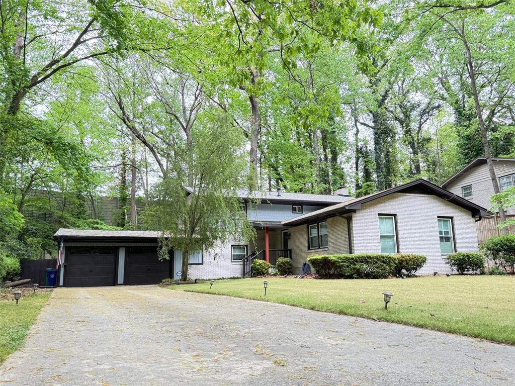 Wonderful 3-Bedroom, 2.5-Bath Home with Finished Basement in Embry Hills - Excellent Location! Welcome to this beautifully renovated home in the highly sought-after Embry Hills neighborhood, nestled between Atlanta and Metro Atlanta. Offering a perfect blend of modern updates and classic charm, this 3-bedroom, 2.5-bath home is move-in ready and ideal for comfortable living. Key Features: Location: Located in a very safe, family-friendly community, Embry Hills offers convenient access to both Atlanta and Metro Atlanta, making commuting and weekend adventures a breeze. The home is in close proximity to shopping, dining, schools, parks, and major highways (I-85, I-285, and GA-400), providing an ideal location for work and play. Bedrooms: 3 spacious bedrooms, including a master suite with a private bathroom. Bathrooms: 2.5 beautifully updated bathrooms, featuring modern fixtures and finishes. Finished Basement: A fully finished basement offers flexible space for a home office, playroom, gym, or entertainment area-perfect for families or those looking for extra space. Renovations: The home was extensively renovated in 2022 with high-end finishes throughout. Enjoy updated flooring, kitchen, and bathrooms, along with fresh paint and upgraded appliances. Exterior: Well-maintained and inviting exterior with a landscaped yard, ideal for outdoor gatherings or relaxing evenings. Parking: Ample parking space with a 2-car garage and additional driveway space for guests. This home offers not only comfort but also peace of mind, with a secure and friendly neighborhood. Whether you're looking for a place to settle down or invest in an excellent location, this property is a must-see! Schedule a Tour Today! Don't miss out on the opportunity to own this beautiful home in one of the most desirable neighborhoods in the area.