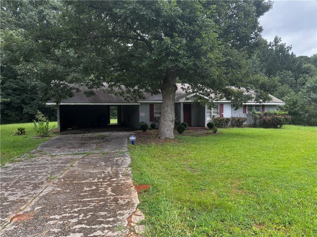 Award Winning Parkview High School district is where this home /lot has great potential! 3bd/1ba ranch Fixer upper in beautiful revitalized Lilburn on a 1.61 +/- ac level lot . Great schools.This house would make a great rental property for an investor or buy the lot to build your new custom estate home . Lots of privacy .Do not walk property by appointment only . Sold "As Is" .