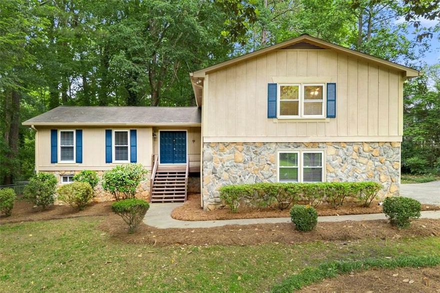 Nestled in one of East Cobb’s most sought-after school districts—zoned for top-rated Walton High School—this spacious 5-bedroom, 3.5-bathroom home offers room to grow, incredible value, and unbeatable location. Inside, you’ll find a mix of real hardwoods, luxury vinyl plank, linoleum, and carpet that define each space with comfort and function. The formal dining room showcases hardwood flooring and opens to a back deck perfect for entertaining. A gas Whirlpool double oven and five-burner cooktop anchor the kitchen, complete with white marble countertops, stainless steel appliances, and a bright breakfast nook with LVP flooring.

The den features a cozy wood-burning fireplace with a rock surround and access to a screened-in porch, offering indoor-outdoor flow. Downstairs, a finished lower level includes a concrete patio, kitchenette area with ceramic tile, and low ceilings ideal for a rec room, guest suite, or extra storage. The primary bath includes a dual vanity with a marble counter, and ceramic tile finishes are featured in all baths.

Enjoy a serene fenced backyard with a mix of privacy and chain-link fencing, a 2-car garage, and close proximity to major highways, shopping, dining, the Avenues and easy access to the Atlanta airport. This is the opportunity to own in a premier East Cobb location with room to make it your own. There is an optional HOA with pool and tennis. 

0PEN H0USE SATURDAY 5/24 2:00-4:00!
