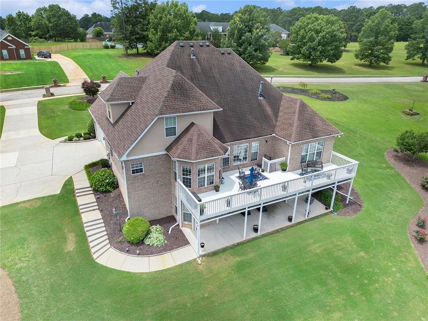 Simply AMAZING: Four side brick, 5 bedrooms, 4.5 bathrooms, full finished basement, separate Living Room, Dining Room, Family Room, Kitchen with granite countertops, Large deck overlooking lake, Boat garage door in basement, Beautiful Landscape, No HOA, and much more. This home is a beautiful 5BR/4.5BA brick 2 story, with a great floor plan. It has upgrades galore, and a wonderful bonus room. Flooring in the home includes tile, woods, and carpet. The huge primary bedroom has a large sitting area and a luxurious bath w/whirlpool tub. The kitchen is fit for a chef w/large walk-in pantry, granite counters, center island, stainless steel appliances, and gas range w/convection oven. Adjacent to the kitchen is a family room w/fireplace, and the entrance door to a large deck overlooking a lovely garden and lake. This house is located on a 1+/- acre lot. NOTE: Property taxes reflect an exemption to the school tax by the current owner. Thank you for your interest in this home and I look forward to working with you.