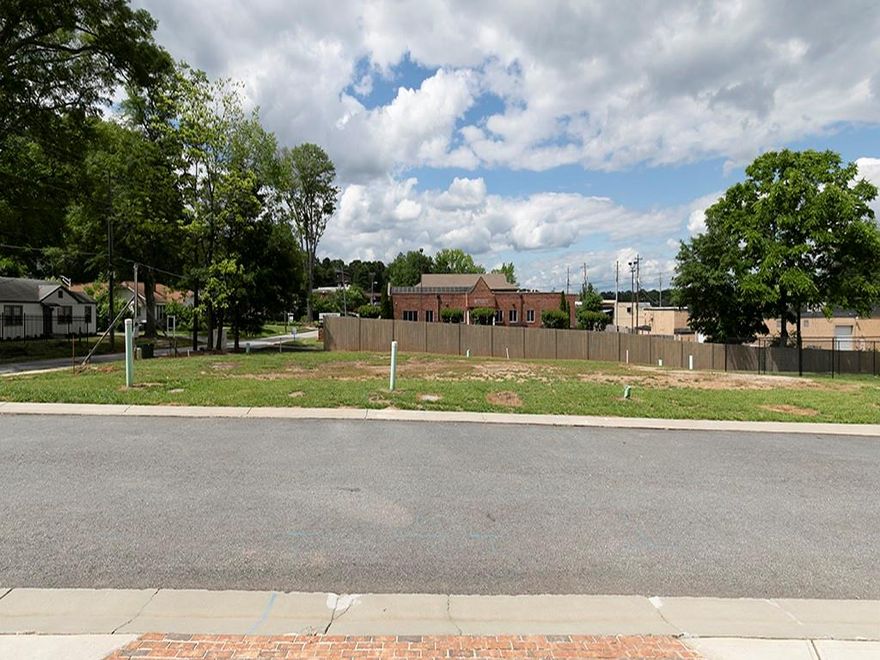 Don't miss this rare opportunity to own four ready to build townhome lots in one of Marietta's most vibrant and walkable neighborhoods! Just a short stroll to the Marietta Square, these lots are perfectly positioned near shopping, dining and public transportation in an established townhome community. There are four luxury townhomes already built and owner-occupied in the subdivision.