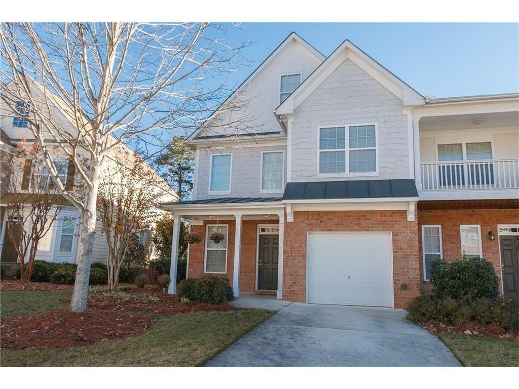 THIS BEAUTIFUL TOWNHOME IS LOCATED ON A CORNER LOT IN POPULAR ST. CLAIRE NEIGHBORHOOD IN A SWIM COMMUNITY WITH TWO MASTER SUITES WITH GARDEN TUBS IN BATHROOMS WITH DUAL VANITY AND ONE ON MAIN FLOOR. KITCHEN FEATURES GRANITE C/TOP, BLACK APPLIANCES, BREAKFAST BAR, TILE FLOOR, WALKIN PANTRY, 2 STORY GREAT ROOM W/GAS LOG F/PLC. ATTACHED GARAGE, LEVEL DRIVEWAY FOR 2 CARS, MOVE IN READY. CLOSE TO GA 400 AND WINDWARD SHOPPING AREA, AND GREAT SCHOOL DISTRICT AND VERY CLOSE TO NEW FORSYTH HALCYON, PLENTY OF GUEST PARKING SPOTS IN THE NEIGHBORHOOD.