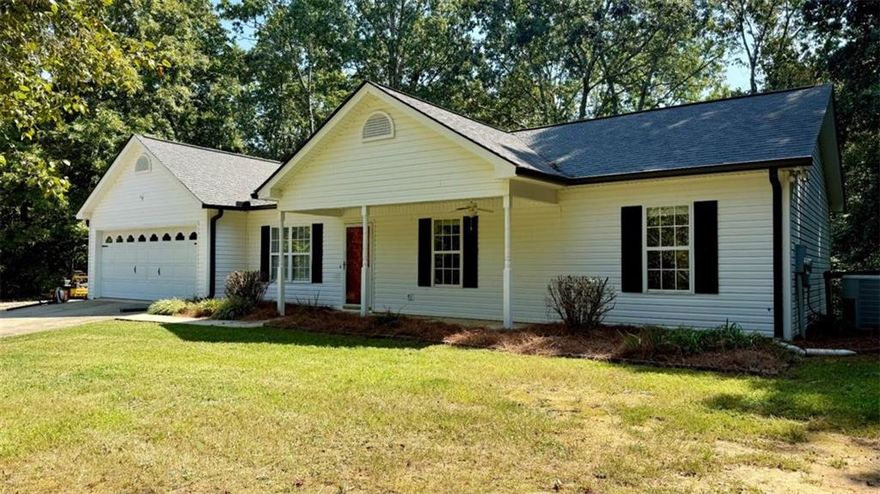 Great Location in Lula, GA! Conveniently located just minutes from Highway 985, this charming 3-bedroom, 2-bath home is perfect for commuters and offers the ideal blend of comfort and convenience. Step inside to an open floor plan with vaulted ceilings that create a spacious and airy feel. The kitchen and living areas flow seamlessly-perfect for entertaining or relaxing with family. The master bedroom features its own en suite bathroom, providing a private retreat. Two additional bedrooms and a full bath are ideal for children, guests, or a home office.Enjoy peace of mind with a fully fenced backyard-perfect for kids to play safely or for your furry friends to roam freely. A dedicated laundry room adds extra functionality and a 2 car garage is a perfect addition.   Whether you're a first-time homebuyer or looking to downsize, this home is a fantastic choice in a prime location. Don't miss out!