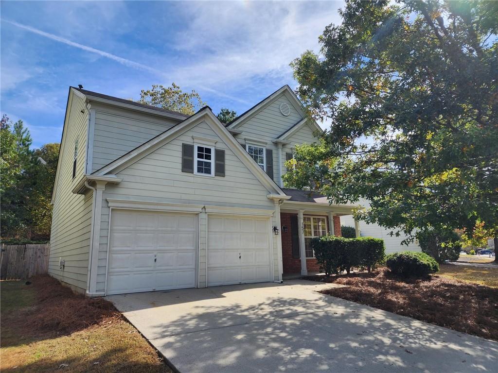 Large 2-story home in prestigious family neighborhood- Brookshire. 2-car garage, fenced backyard, newly updated kitchen, ready for occupancy. Two pools, several tennis court, open field, playground, community access to Rope Mill Park with some of the best fishing, kayaking, walking and mountain bike trails in the state. Minutes from downtown's trendy walking district, EASY access to I-575 and walking distance from The Outlet Shoppes of Atlanta. GREAT LOCATION!