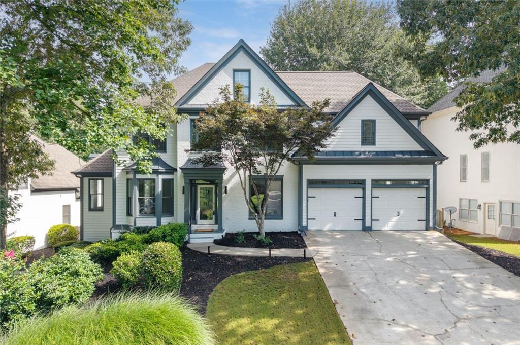 Back on the market by no fault of the seller! Buyers decided to move to another state! Now is your opportunity to step in to this this beautiful home in the Johns Creek High School district which features four bedrooms, three and a half bathrooms, and a finished basement. The main level offers a formal living room/home office, a separate dining room, and an eat-in kitchen with granite countertops, (wait until you see the amazing scullery with second sink!), a bright sunroom and a lovely family room showcasing a stone fireplace and double doors leading to the deck. This chic home has been thoughtfully painted a soft neutral grey color throughout and has gleaming hardwood floors on the main level.
The primary suite includes a spacious en-suite bathroom and a large walk-in closet. The three secondary bedrooms are generously sized. The finished basement provides additional flex space and has a private side entry, and the oversized laundry room has cabinetry, lots of counter space and a utility sink. Stepping outside, the large, fenced backyard features a beautiful oversized deck with a pergola and is perfect for your outdoor enjoyment.
Oak Bridge is a lovely swim and tennis community and is just 10 minutes from Avalon and GA-400, close to Newtown Park and the Chattahoochee River National Rec Area at Jones Bridge, and convenient to lots of shopping and restaurants.
Preferred lender, Don Thelen, with Guaranteed Rate Affinity, will offer up to $3,000 in lender credit for closing costs, pre-paids, escrows or home warranty with approved offer. Conditions apply.