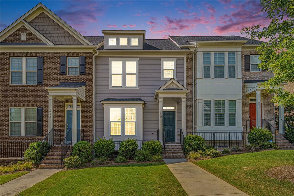Enjoy the comfort and convenience of luxury townhome living in a prime location.
This beautifully designed 3-level townhome nestled in a gated community in Cobb County.
This spacious home features 3 bedrooms and 3 baths. An open-concept main level with seamless flow between the living room, dining area, and sunroom, perfect for everyday living and entertaining. The top floor offers a serene primary suite with a private deck and a comfortable secondary bedroom, while the lower level includes a private guest suite ideal for visitors or extended stays. Additional highlights include a two-car garage and access to top-tier community amenities such as full-size tennis courts and a resort-style swimming pool.
