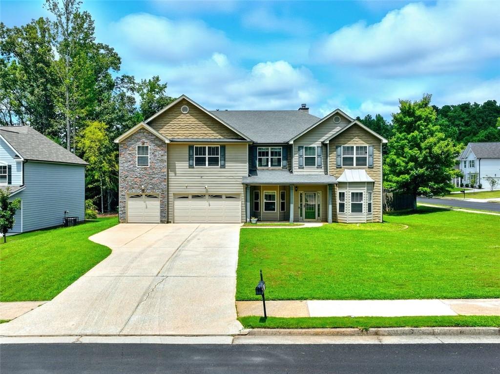 TThis approximately 5,119-square-foot home offers five bedrooms and four full bathrooms, thoughtfully designed with both elegance and comfort in mind. Featuring coffered ceilings and oversized rooms, the residence exudes a refined ambiance throughout.
The primary suite is a true retreat, complete with a sitting area, walk-in closet, and a cozy fireplace, while the great room also showcases a fireplace, adding warmth and charm to the main living space. A guest bedroom retreat provides privacy and comfort for visitors.
Expansive bay windows fill the interior with natural light, highlighting the home’s inviting layout. The spacious foyer creates a grand first impression, making the home ideal for hosting and entertaining. A full laundry room adds everyday convenience, while the loft area offers versatile space—perfect for a pool table, lounging, or entertainment.
Situated on a large, level corner lot, the property provides plenty of outdoor space for recreation or relaxation. Fresh exterior paint enhances the home’s curb appeal, making it move-in ready both inside and out.