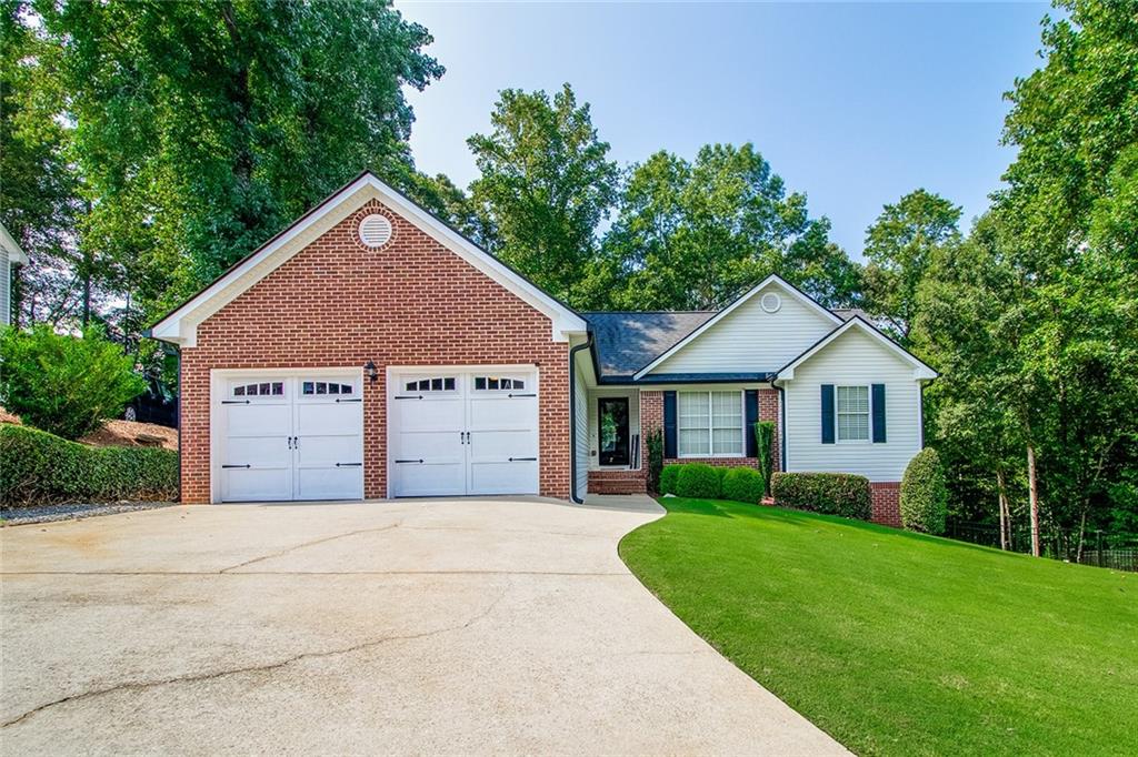 This beautifully renovated open-concept ranch sits on a full finished basement in a quiet cul-de-sac—offering the perfect blend of modern updates, privacy and convenience in an excellent school district with NO HOA. Inside, the heart of the home features an upgraded kitchen with custom cabinetry, granite countertops and a farmhouse sink. Real hardwood floors flow throughout the main living areas, creating warmth and timeless appeal. The newly finished basement expands your living space with a built-in bar, bedroom/office/flex space and half bath—ideal for entertaining, guests or a private retreat. A walk-out door leads straight to the backyard for easy access. Outdoor living is a dream here. Enjoy mornings on the renovated screened-in porch or host gatherings on the brand-new deck with stairs leading down to the gorgeous, manicured backyard. The yard has been thoughtfully landscaped and features an iron fence with two gates, offering both style and function. Relax and take in the quiet natural setting. This home checks all the boxes—renovated, move-in ready, private lot, and endless indoor/outdoor living opportunities.