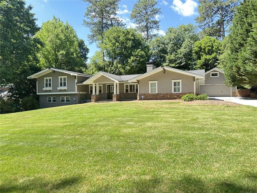 Exceptional opportunity to own a beautifully renovated home, on a quiet street in the highly sought after Oak Grove Elementary and Lakeside High School district. This comfortably chic home is designed for how people live, work, play today. This unique home seamlessly integrates functional spaces with a private outdoor oasis, creating the perfect backdrop for both everyday living and grand entertaining.
Step inside from the welcoming front porch and be greeted by an open airy great room with vaulted ceilings with an effortless flow to the heart of the home, a well-appointed kitchen with custom cabinetry and expansive island, perfect for entertaining. Step out to a beautiful patio, extending the living space outdoors to a private fenced backyard – an ideal setting for relaxing, al fresco dining and creating lasting memories for all ages.

Escape to the oversized primary suite, a sanctuary complete with a spa-inspired bath. Three additional bedrooms and three renovated baths provide ample space for everyone. The lower level features an expansive family room with a striking stone fireplace and real sandstone flooring, along with another potential bedroom, that can also be used as a private office - perfect for those that work from home. Conveniently located on this level is a laundry room and another half bath. Built in desks and murphy bed are amazing.

An actual detached oversized two-car plus garage that offers endless possibilities – cars protected from the elements with storage galore above. This oversize garage could easily be converted to a state-of-the-art home gym, an artist studio, or even an in-law suite….the possibilities are endless. You'll love the proximity to all the award-winning schools (both public and private), parks, playgrounds, pools and the new multi-use path. Phenomenally easy access to the Atlanta Airport, CHOA, Emory, CDC, I85, Buckhead, Midtown, and beyond.

Must See!