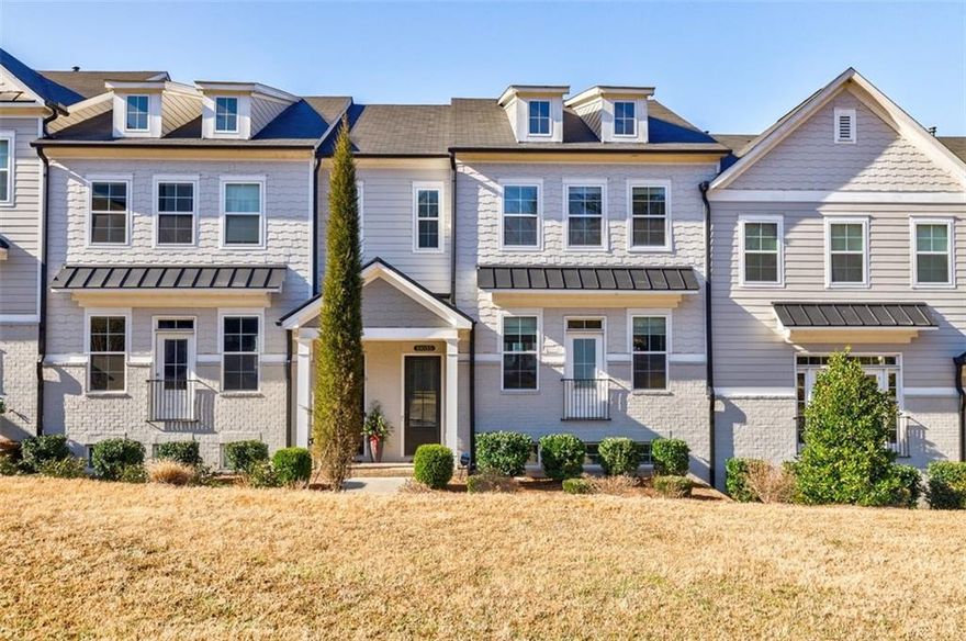 Welcome to 10035 River Rock Drive, a stunning residence nestled in the heart of Roswell, GA. This modern townhome offers a perfect blend of luxury and convenience, ideal for those seeking a vibrant lifestyle near Downtown Roswell. The open-concept floor plan features 4 spacious bedrooms and 3.5 beautifully designed bathrooms. Step inside to find gleaming hardwood floors throughout, enhancing the home's chic aesthetic. The luxury chef’s kitchen is a culinary enthusiast's dream, featuring top-of-the-line appliances and sophisticated finishes. The spacious owner’s suite provides a tranquil retreat with a spa-inspired bathroom. Designed for today's lifestyle, this home is equipped with an EV charging-ready garage and an elevator-ready design, ensuring future convenience. Enjoy the outdoors with a private patio and take advantage of the common outdoor space within this gated community, offering added security and peace of mind. Located just 5 minutes from GA-400, this prime Roswell location provides easy access to award-winning restaurants and bars. Nature lovers will appreciate the direct trail access, perfect for biking, jogging, kayaking, paddle-boarding, and scenic riverfront recreation. Experience low-maintenance luxury living in a boutique townhome enclave that promises both a family-friendly atmosphere and a safe, secure environment. Don't miss the opportunity to make this your new home!