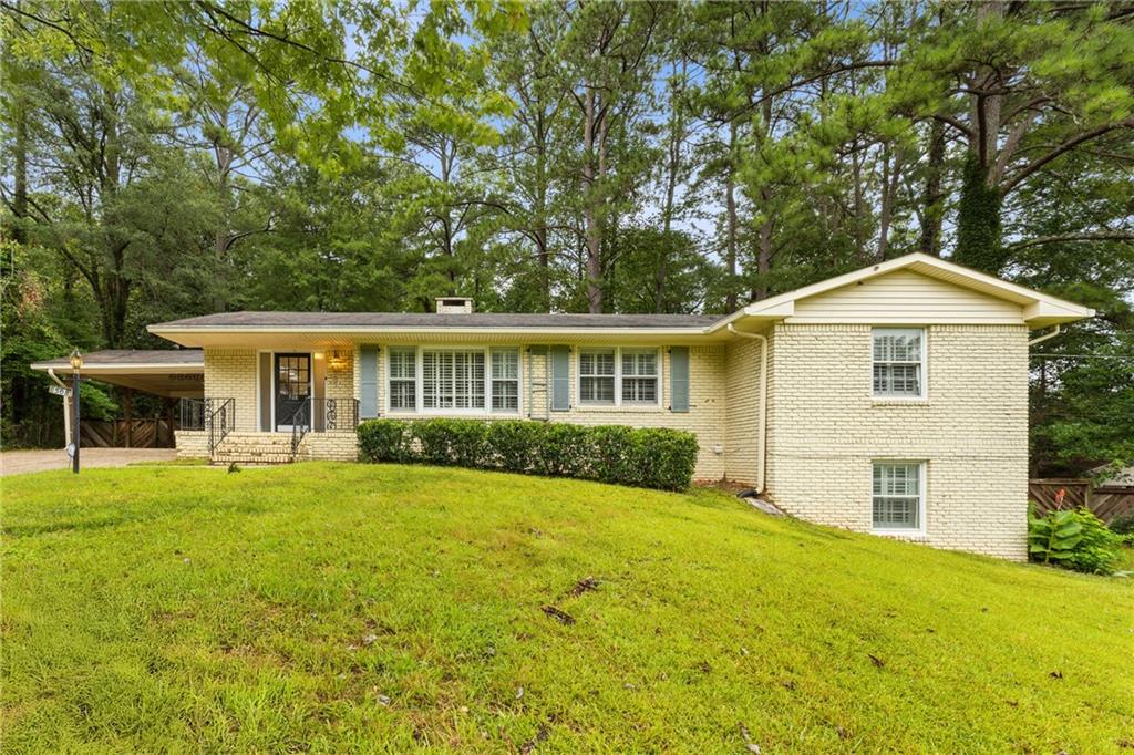 Great Investment or Spacious Home for a Large Family! This 6 bed, 3 bath property features 4 beds and 2 baths on the main level, plus a 2 bed, 1 bath finished basement—ideal for in-law suite or rental potential. Located in a quiet Stone Mountain neighborhood with easy access to major highways, schools, and Stone Mountain Park. Versatile floor plan with strong income potential or perfect for multi-generational living.