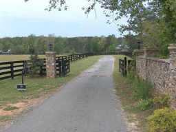 50 ACRE EQUESTRIAN ESTATE IN SOUGHT AFTER MITLON COMMUNITY. PROPERTY INCLUDES 3 HOUSES, 1 APT., 5 BARNS, COVERED RIDING ARENA, STOCKED LAKE. PASTURES ARE MATURE AND FENCED. A HORSE LOVERS DREAM COME TRUE!! CAN SUBDIVIDE 20 ACRES + BARN W/ APT. @ $95,000./ACRE. ROAD FRONTAGE ON NEW BULLPEN RD. ALSO.