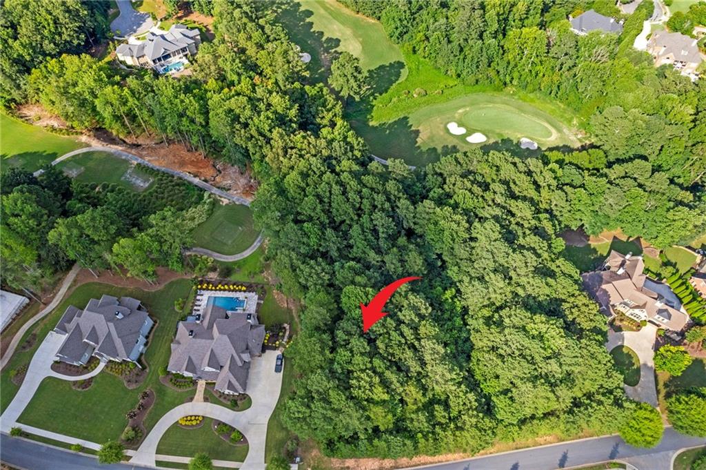 Welcome to 681 Carl Sanders Drive, an extraordinary opportunity to build your dream home on one of the most beautiful golf course lots in the highly coveted Governor’s Towne Club—a private, gated country club community located in Acworth, Georgia. Perfectly positioned along the lush fairways of the award-winning Curtis Strange-designed 18-hole golf course, this prime homesite, overlooking both the 6th and 7th hole, offers breathtaking views, gentle topography, and an unparalleled backdrop for luxury living. Whether you envision a sprawling estate or a custom retreat, this lot provides the ideal canvas to bring your vision to life. Governor’s Towne Club is North Atlanta’s premier lifestyle community, offering an unmatched array of amenities including a full-service clubhouse, day spa, fitness center, tennis and pickleball courts, resort-style pool, and a vibrant calendar of social events for all ages. Residents enjoy a relaxed, upscale atmosphere with convenient access to top-rated schools, shopping, dining, and major highways. This is more than just a homesite—it's a lifestyle opportunity in one of the South’s most prestigious golf communities. Don't miss your chance to claim one of the last golf course lots in Governor’s Towne Club. Come experience the perfect blend of luxury, leisure, and location.