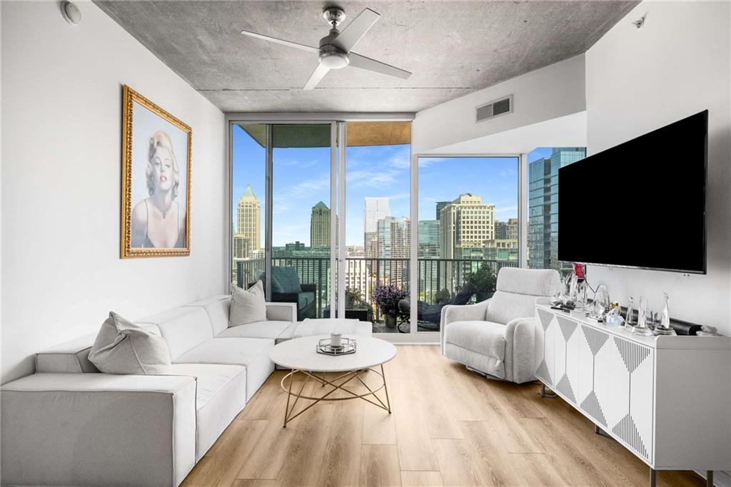 Experience elevated city living in this beautifully renovated 21st-floor residence in the heart of Midtown. Bathed in natural light, this thoughtfully designed 2-bedroom, 2-bath condo offers breathtaking skyline views and unmatched convenience—just steps from daily essentials and minutes from Piedmont Park.
Inside, enjoy hardwood floors throughout, a sleek waterfall kitchen island, stainless steel appliances, and a dry bar with dual-zone beverage and wine fridge. The spacious living and dining areas are perfect for entertaining, with all top-of-the-line appliances included for tenant use.
Two assigned parking spaces are provided, one with a private EV charging station. High-speed internet is included. Building amenities feature 24/7 concierge service, resort-style pool, state-of-the-art gym, outdoor kitchen, and more.
This residence rents for $3,600/month unfurnished or $3,950/month fully furnished. Tenant qualifications: no evictions, no criminal history, and income of at least 40x monthly rent annually.
Available November 1st—schedule your private showing today and make Midtown living yours!