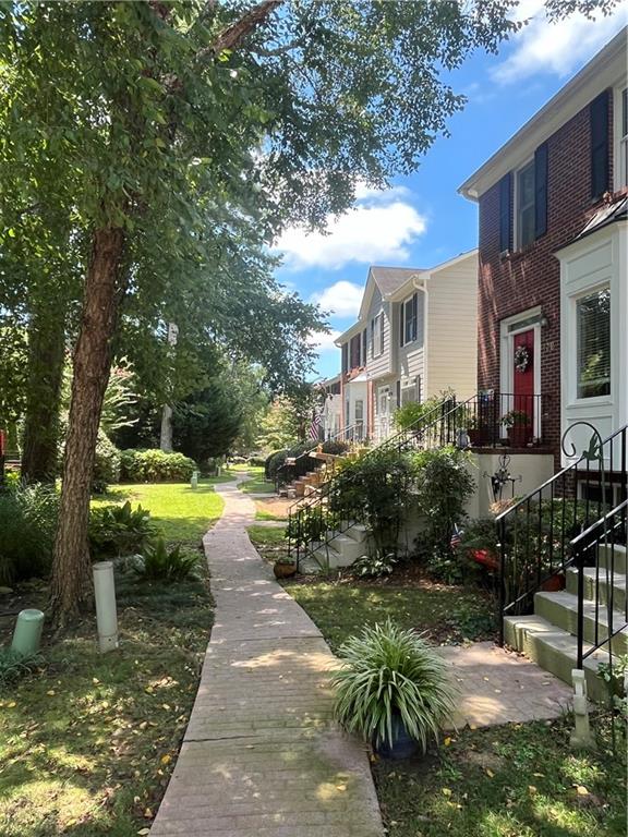 Want to be close to Marietta Square? This is a must see Unit at
Queensbourough Square Town homes. Wonderful end unit close to the pool
with three bedrooms and two full baths. This townhome has lots of
character with arched doorways and a a touch of vintage flare. Hardwood
floors through out, Separate dinning room overlooking the creek and
beautiful landscaping. Kitchen has a a beautiful custom made built in bar!
Family room with hardwoods and electric fireplace and overlooks a private
fenced courtyard with a brick patio. Upstairs has three good sized bedrooms
and laundry room. Two car garage .The community has beautiful brick
walking paths,two little bridges, two clubhouses, swimming pool and tennis
court. So close to Laurel Park, Kennesaw Mountain. Marietta Square,
shopping and restaurants. New windows through out 2023, new exterior shutters,
Crawl space encapsulated, air ducts and dryer vents cleaned, custom bar,
new garage door springs, new dishwasher, Refrigerator & stackable washer
and dryer included. Transferrable home warranty with American Home Shield.