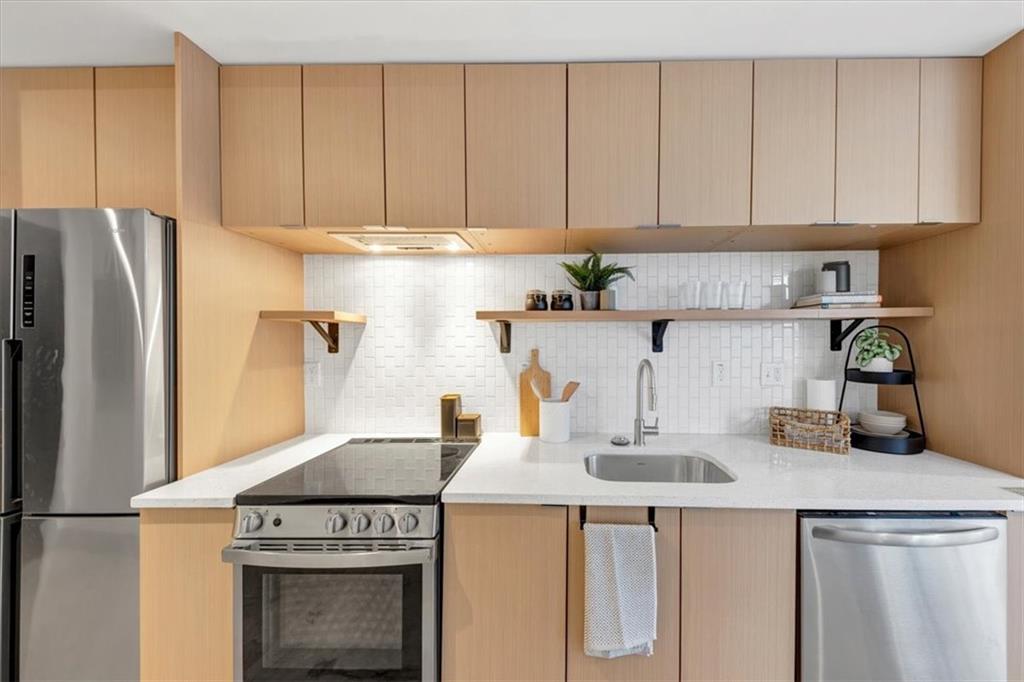 Buyers, investors, and entrepreneurs-this is your chance to secure an affordable, modern loft-style condo in the heart of downtown College Park. With only a limited number of units available, these stylish, high-ceiling residences are selling quickly. Perfectly positioned across from the MARTA Station, ION Condos offers a seamless blend of urban convenience, modern design, and artistic flair. Each unit features 10-foot ceilings, track lighting, sleek concrete floors, quartz countertops, and custom artist-designed bathrooms, creating a unique and contemporary living experience. Beyond the stunning interiors, residents will enjoy direct access to PushPush Arts, a vibrant cultural space on-site, and an unbeatable location just minutes from Hartsfield-Jackson Airport, Woodward Academy, Main Street's top shops and dining, and the dynamic Six West Project. Eligible buyers may qualify for up to $30,000 in down payment assistance, making this an even greater opportunity. These condos will not last long. Contact us today for more details or to schedule your private tour before it's too late.