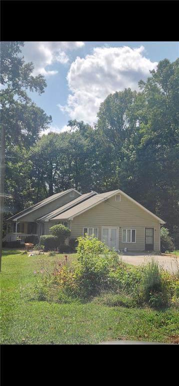 GREAT OPPORTUNITY TO BUILD UP TO 30,000 SQ FEET OF BUILDING , ALREADY ZONED CBD. THIS PROPERTY IS FOR SALE WITH THE AJOINING PROPERTY IN FRONT ( 3041 CANTON HWY) GIVING ONE ENTRANCE/EXIT FROM CANTON HWY AND ONE FROM THE SIDE STREET AARON SOSEBEE. THIS CORNER WILL BE A LIGHT CONTROLLED CORNER ADDING ADDED VALUE. THIS PROPERTY IS IN THE FORSYTH COUNTY SPECIAL DEVELOPMENT NODE GIVING ADDED VALUE.
THE CURRENT HOUSE IS LEASED AND OCCUPIED.
THE COMBINED TWO LOTS WILL GIVE YOU 7.63 ACRES OF LAND. THE ADJACENT LOT IS CURRENTLY AVAILABLE FOR $1.050 MLLION DOLLARS OR $350,000 PER ACRE.