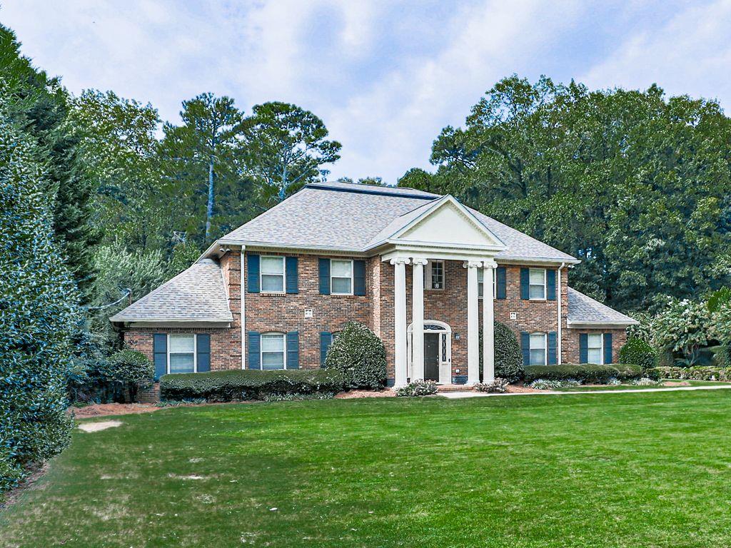 Do not miss this executive masterpiece in gorgeous Terrell Mill Estates. Classic, traditional styling and rock-solid construction of 4-sides brick and steel beams. Sprawling floorplan with plenty of room to spread out on 3 finished levels. Each of the 5 bedrooms has an ensuite bath and walk-in closet. Stylish traditional floorplan features a grand 2-story Foyer with curved staircase, formal Living and Dining Rooms, island Kitchen that is open to the large Den and a great Sunroom that overlooks the private backyard and pool. The main level also features a private guest bedroom with full bath, Powder Room, and office that looks out to the front yard. The upper-level features 4 large bedrooms, each with ensuite bathroom. The enormous owner suite has his and her bathrooms! Fun terrace level for entertaining features a billiards room, full bath, bar and Kitchenette, Media Room, and storage room. There is a rear entry garage on the terrace level for outdoor toys or tools. Beautiful 20 x 40 inground pool and gazebo to enjoy the private 1.18-acre lot. All rooms are very large and really give the feel of having a lot of room to spread out and many options for furniture placement. Quality 4-sided brick construction with steel beams in basement, hardwood floors, insulated windows, extra insulation and radiant barrier in attic and much more. Unbeatable location just minutes to Truist Park, Interstates 75 and 285 and all major travel routes and a myriad of shopping and dining choices, golf, hiking, kayaking, and much more. Also, at the end of the street there is access to the Cochran Shoals Unit of Chattahoochee River Recreation Area and nearly 1000-acres of hills and forest to explore and miles of hiking trails and 7-miles of mountain bike trails! The right updates and decorator touches will make this a showplace to enjoy for generations!