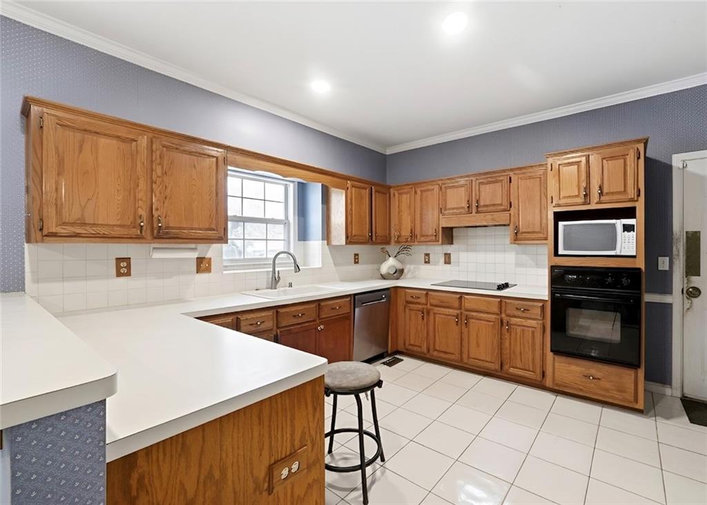 Photo of 345 Oak Springs Drive NW, Lawrenceville, GA 30043 (MLS # 7786438)