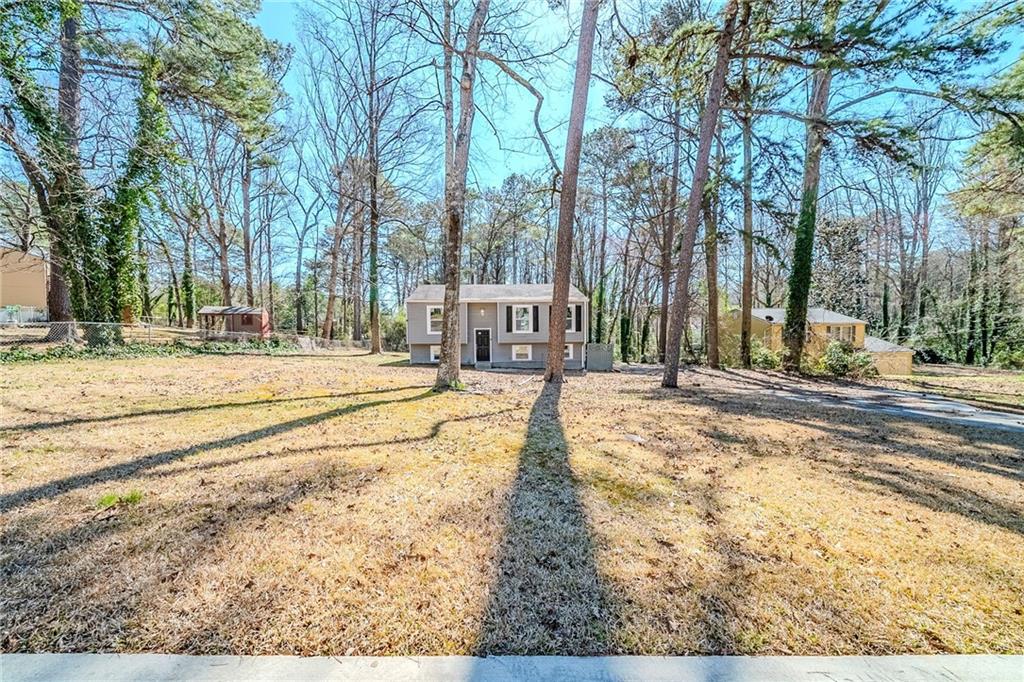 Investor special or perfect for a savvy homebuyer looking for a renovation project! This fixer-upper, located in a well-established Snellville neighborhood, offers incredible potential to restore and customize. Featuring a functional layout with spacious living areas, this home is ready for your vision and improvements.The property sits in a convenient location near schools, shopping, dining, and major highways, making it an excellent opportunity for a flip, rental, or long-term investment. Bring your creativity and make this home shine again! Sold **as-is**—schedule your showing today!