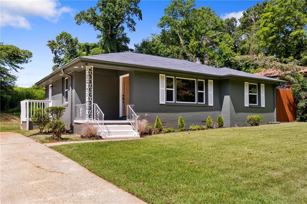Welcome to this beautifully refreshed 3-bedroom, 2-bath home where comfort meets style. Thoughtfully updated with new flooring, HVAC, plumbing, and electrical, this home offers peace of mind and modern convenience. The open concept layout is perfect for both everyday living and entertaining, with natural light pouring in to highlight the warm, natural stained hardwood floors throughout.
The kitchen features brand new appliances, offering a sleek and functional space to prepare meals. Conveniently tucked away, you’ll find a dedicated area for a stackable laundry unit, making the most of every square foot.
The hall bathroom showcases open shelving for linens and a tub accented with timeless basketweave pattern tiles. In the primary suite, the bathroom boasts a tall, spa like shower with eye catching chevron style tiles.
Outside, the home’s exterior is painted in a sophisticated pewter green a modern, muted shade that blends the calmness of sage with the depth of gray offering inviting curb appeal. A spacious front lawn and expansive backyard provide endless possibilities, from gardening to building your dream outdoor oasis.
With no HOA, you’ll enjoy both freedom and flexibility in how you make this home truly yours.