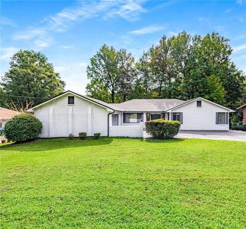 Photo of 234 Shadow Lake Drive SW, Lilburn, GA 30047 (MLS # 7642448)