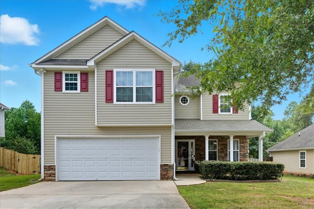 This beautifully maintained 3 bedroom, 2.5 bathroom home offers over 2,100 sq ft of living space and is ready for its next owner. Step inside and be greeted by soaring 18 ft ceilings in the living room, a cozy fireplace, and a layout designed for both comfort and function.
The spacious kitchen features an island, ample storage, and plenty of room to gather — perfect for family meals or entertaining guests. Upstairs, you’ll find two secondary bedrooms connected by a convenient Jack & Jill bathroom, while the primary suite provides its own retreat.Recent updates include a brand-new HVAC system (2024), giving peace of mind for years to come. Outside, enjoy the fenced backyard, ideal for kids, pets, or weekend barbecues.Whether you’re a family searching for more space or an investor looking to add to your rental portfolio, this home checks all the boxes.