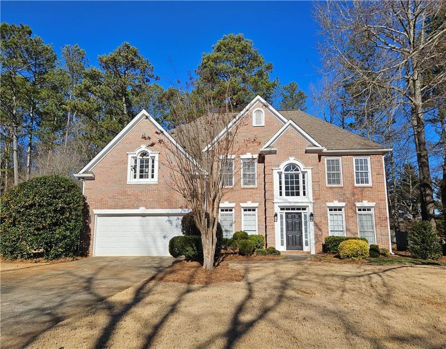 Don't miss out on this rare 4 bedroom 2.5 bath home located in West Cobb. The property features fresh paint and bamboo hardwoods throughout the home. The kitchen features an island, granite counterops/backsplash, double pantry and provides a view of the family room. Seperate dining and formal living room. Updated fixtures throughout. Laundry room located on the main level. Spacious primary bedroom with tray ceilings and huge walk-in closet with new carpet. Luxurious freshly renovated primary bathroom features a double vanity with quartz counters, stand alone garden tub and separate tiled shower. Matching renovated secondary bathroom features a tiled shower/tub combo. Nice lot with level front and backyard. The community features a playground, tennis courts and swimming pool. No pets.