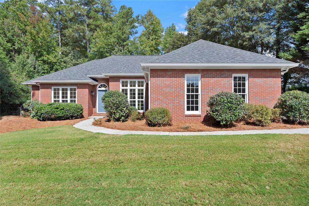 Welcome to 1620 Greystone Road in Cumming, GA, a beautifully updated ranch home set on over three-quarters of an acre in the sought-after Greystone Forest community. Combining timeless design with modern upgrades, this residence offers effortless living just five minutes from downtown Cumming.
Recent enhancements include a brand-new roof, new flooring throughout, fresh interior paint, storm windows, professional landscaping, and a newly renovated primary bath. The single-level layout features 4 bedrooms and 2 baths, with the primary suite on main serving as a true retreat. Enjoy a spa-like bath with a soaking tub, double vanity, and walk-in closet.
The home also includes a formal dining room, bright breakfast area with bay windows, and a large laundry room for added convenience. A 2-car garage offers functionality, while the freshly landscaped grounds and wide lot provide welcoming curb appeal.
Outdoors, the flat, fully fenced yard offers privacy and opportunity, with ample space for a pool, garden, or future outdoor additions.
Nestled in a quiet neighborhood with no HOA and away from busy streets, this home provides the rare combination of tranquility and accessibility. Enjoy close proximity to Lake Lanier, GA-400, shopping, dining, and all that North Georgia has to offer.