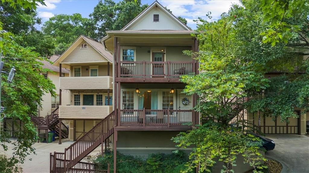 Welcome to this stunning three-story townhome in one of Atlanta’s hottest neighborhoods — Underwood Hills — just minutes from The Works, Topgolf, Westside Ironworks, and the future BeltLine extension! The expansive main level features soaring ceilings, elegant crown molding, and gleaming hardwood floors throughout. Large windows flood the space with natural light, while the open-concept layout makes entertaining a breeze. The fully renovated kitchen includes a spacious island with bar seating, stainless steel appliances, a coffee/dry bar with wine fridge, and an adjoining keeping room with a fireplace and walk-out shaded patio.Upstairs, the oversized primary suite offers a private balcony, a walk-in closet, and a gorgeous renovated en-suite with high-end finishes. Two additional bedrooms share a full bath on the upper level, along with a separate walk-in laundry room for added convenience. Additional highlights include an unfinished daylight basement, stubbed for a bathroom — perfect for a future fourth bedroom or flex space — and a two-car garage with a Level 2 EV charger. Enjoy prime walkability to shops, dining, and green space. Don’t miss your chance to own a beautifully maintained, move-in ready home in this vibrant and growing West Midtown community!