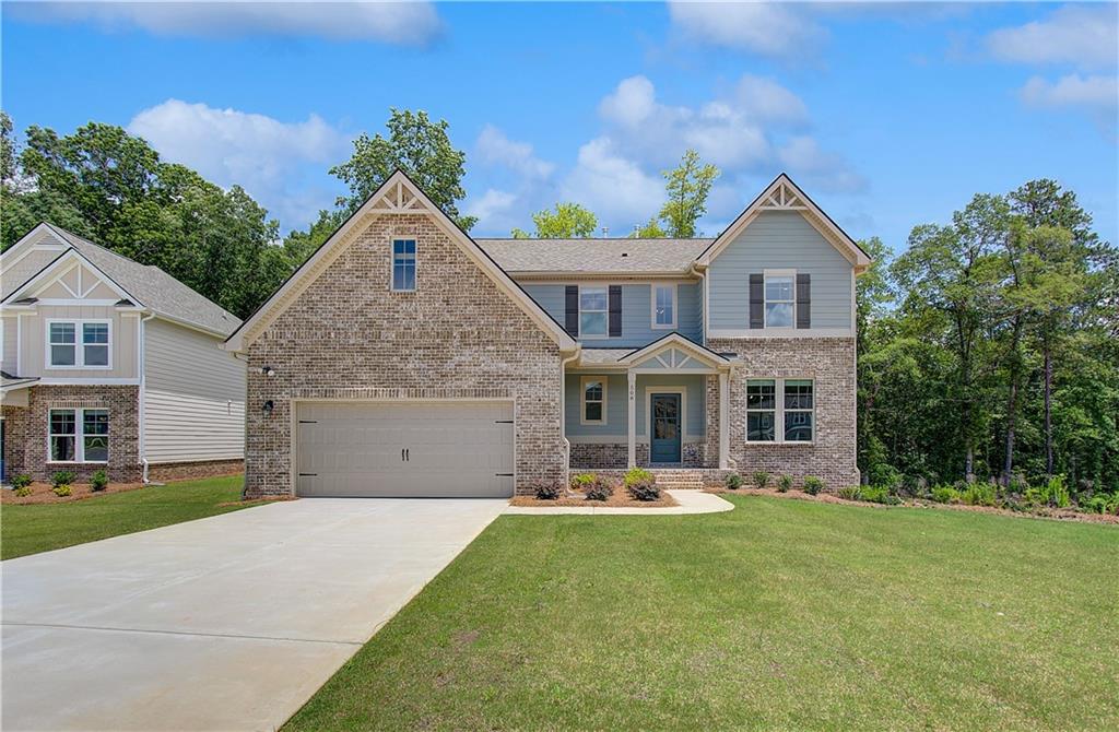 READY RIGHT NOW! Welcome home to Kingston, nestled in a sought-after gated community in Locust Grove and thoughtfully crafted by DRB Homes! This stunning single-family home boasts an exquisite craftsman-style exterior and is designed to impress with every detail.
Our spacious Lauren II floor plan, situated on a slab foundation, offers 5 bedrooms, 3 full bathrooms, and a half bath. The owner's suite on the main level is a luxurious retreat, complete with a large walk-in shower, a separate soaking tub, and dual vanities. The 5th bedroom upstairs provides flexibility and could easily serve as a home office, perfect for today's lifestyle.
Step inside to discover a formal dining room with elegant coffered ceilings and a gourmet kitchen featuring quartz countertops, an expansive kitchen island, beautiful cabinetry, stainless steel appliances, and a spacious walk-in pantry. The open floor plan flows seamlessly, creating a welcoming environment for both everyday living and entertaining.
Upstairs, you'll find a bright and inviting loft, a large media room, and ample space for family and guests. This home also includes a full unfinished basement, offering endless possibilities for additional living space or storage. Outside, enjoy the tranquility of a wooded backyard and the convenience of a 2-car garage.
Amenities for the community include a clubhouse and pool, enhancing the lifestyle opportunities at Kingston. Generous incentives are available toward closing costs with an approved lender, making this the perfect time to make this exceptional home yours.
*Please note: The main photo is of the actual home; interior photos and virtual tours are of a decorated model or spec home.*
Please note: If the buyer is represented by a broker/agent, DRB REQUIRES the buyer’s broker/agent to be present during the initial meeting with DRB’s sales personnel to ensure proper representation. If buyer’s broker/agent is not present at initial meeting DRB Group Georgia reserves the right to reduce or remove broker/agent compensation.