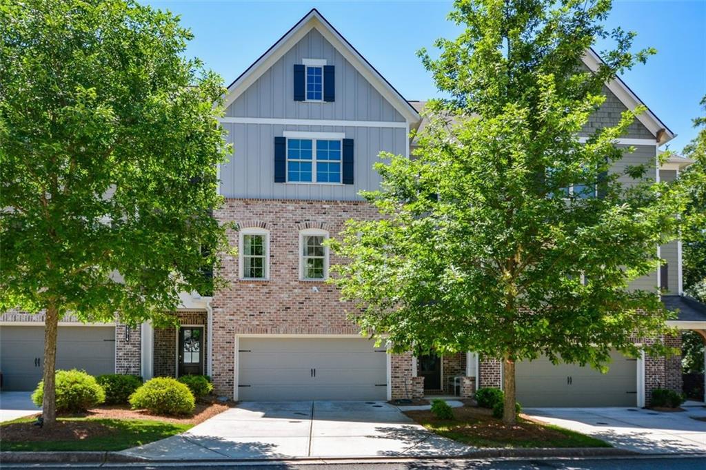Location! Location! Location! Located in the heart of Kennesaw's Entertainment District, you can walk out of your front door right into downtown’s vibrant life. Four-minute walk to the brand new amphitheater, locally owned coffee shops, ice cream parlors and much more. Meticulously maintained, you will fall in love with this one. Each bedroom has its own ensuite and there is a ground level bedroom with a full bathroom and stepless entry. Do not have FOMO, come check it out!