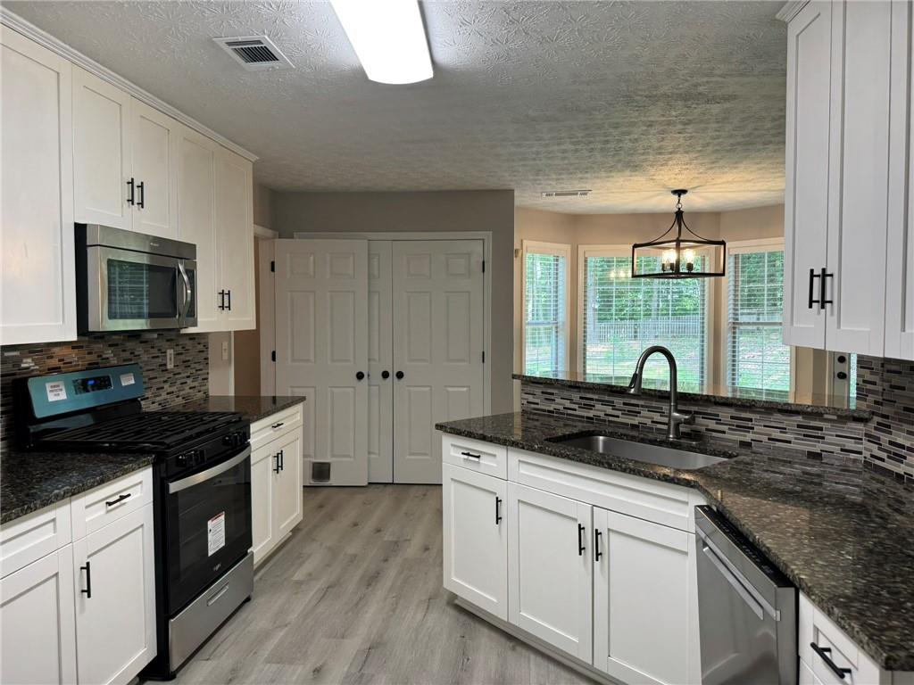 7454 Woody Springs Drive, Flowery Branch, Georgia image 26