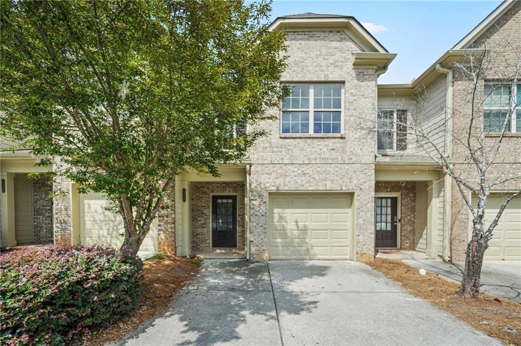 Welcome Home to this beautiful two-bedroom townhome offering the perfect blend of modern comfort and timeless charm. Located in the highly desirable Copperleaf community, this residence is sure to exceed your expectations. Upon entering, you'll be greeted by an open and airy floor plan, illuminated by an abundance of natural light. The living room boasts a cozy fireplace, making it the perfect spot for relaxation and entertainment. New kitchen countertops just installed, elevating the space further. The two spacious bedrooms offer tranquility and privacy, with the primary bedroom featuring an en-suite bathroom and a walk-in closet. The second bedroom is perfect for guests, a home office, a plant room, or a nursery. Both bedrooms are complemented by large windows that offer a view of the peaceful surroundings. Don't miss the opportunity to make this beautifully maintained townhome your own! It's an excellent choice for anyone seeking a comfortable and low-maintenance lifestyle.