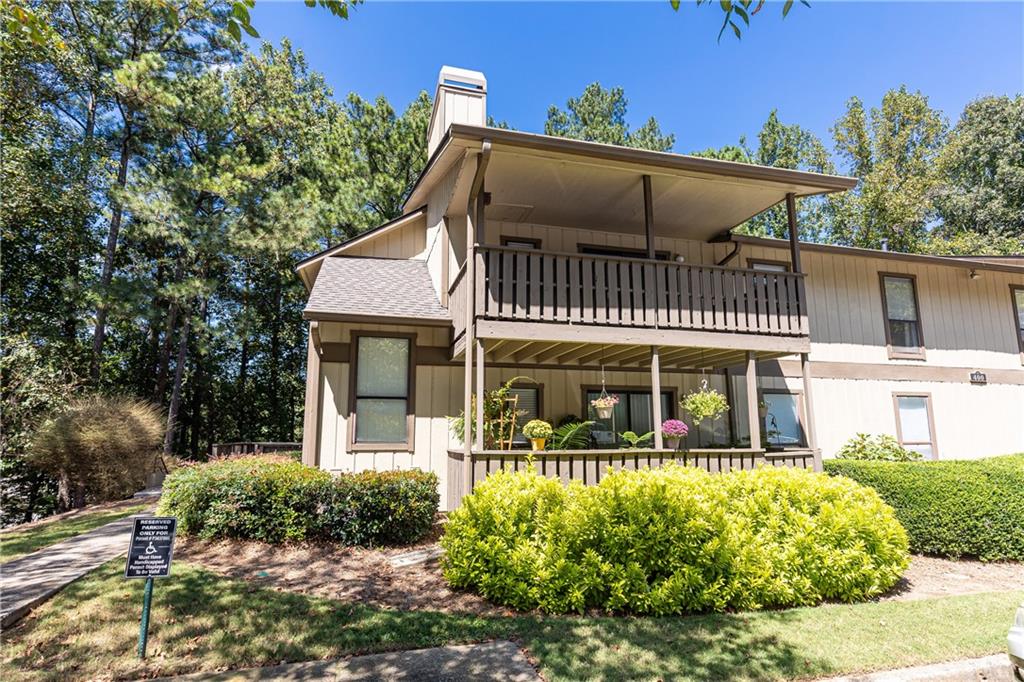 Welcome to this beautifully updated top-floor corner unit in the highly sought-after Woodcliff community. Surrounded by a tranquil wooded setting, this light-filled condo offers stylish upgrades, thoughtful design, and a peaceful retreat from the city. Step inside to discover a renovation that has created an open-concept layout where the thoughtfully remodeled kitchen seamlessly flows into the living and dining areas. Highlights include custom white cabinetry with additional cabinetry in the breakfast bar, stainless steel appliances, granite countertops, and a fresh lighting package. The ceilings have been scraped for a polished look, and the neutral gray and white tones provide a timeless aesthetic throughout. The living area features a gas-lit fireplace, built-in bookcases and a glass slider leading to a large, covered balcony, perfect for relaxing or entertaining. The oversized primary bedroom includes a walk-in closet, and the updated bathroom shines with dual sinks, a new tub, and sleek tile finishes. Additional conveniences include an in-unit laundry room, deep storage closets, and updated systems, including a newer AC and hot water heater. Woodcliff is a well-maintained, owner-occupied community with low HOA dues and rental restrictions in place to ensure long-term care. Residents enjoy exceptional amenities, including a saltwater pool, tennis and pickleball courts, and sidewalks for leisurely strolls. Located in the heart of North Springs/Sandy Springs, this condo offers unbeatable convenience with quick access to GA-400, the North Springs MARTA station, top-rated schools, restaurants, retail, and more. Don’t miss your chance to own this exceptional property in a community that truly has it all—schedule your tour today!