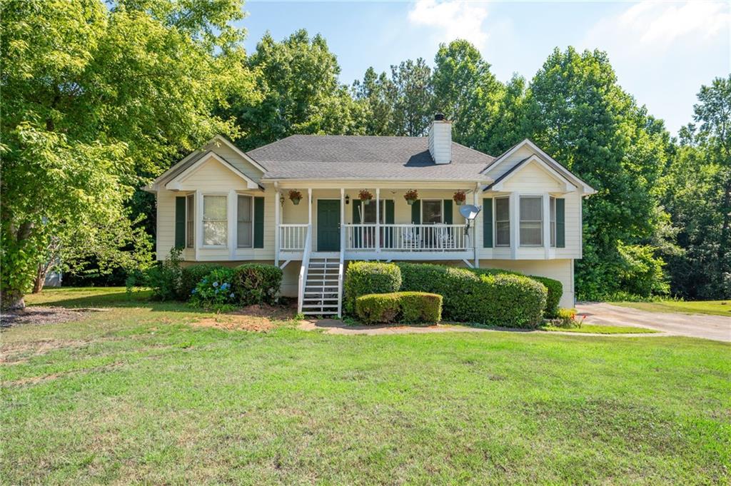 Happy Home in a RAISED RANCH: The home that love built. Welcome to this sought after home in Powder Springs. You will love the space and quietness of this home. Brand new stainless steel appliances, open floor plan with view to dining and kitchen. Basement is partially finished, with large garage space. Sip and see southern front porch for your neighborhood sights.