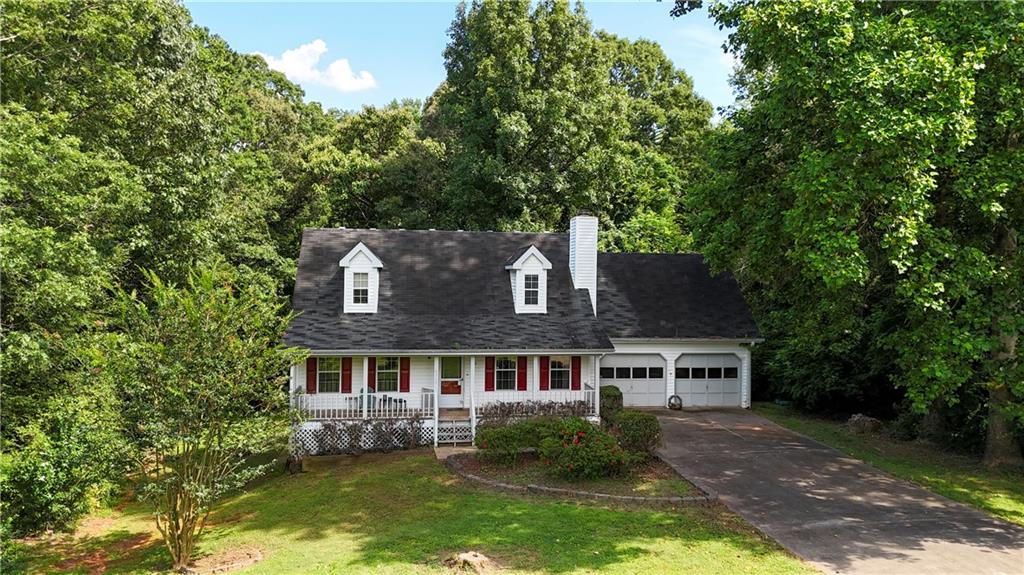 Don't miss this as-is investor special in the heart of Braselton! This 3 bedroom, 2 bath Cape Cod-style home offers endless potential with its classic design and spacious layout. Perfectly situated on a private lot, this property features a welcoming front porch, large yard, and a functional floor plan ideal for rental income or renovation resale. Whether you're looking to expand your investment portfolio or create a custom home, this is your chance to own in a desirable, fast-growing area. Schedule your showing today!
