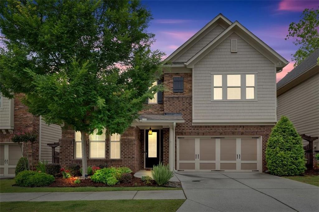 MOVE-IN READY… Freshly painted with new carpet! Located just a short walk to Roswell Town Square, local coffee shops, and excellent restaurants, you are sure to love this exceptional home in the heart of Roswell. As you enter this open floor plan, you will find a family room with a gas fireplace and custom-built bookshelves that flow seamlessly into a spacious kitchen featuring 42” cabinets, a stainless-steel gas cooktop, double ovens, a charming farmhouse sink, and a large island perfect for entertaining. A walk-in pantry adds extra convenience. There’s a full bedroom and bathroom on the main level, ideal for guests, a home office, or a playroom. Upstairs, you'll love the primary suite, which offers a well-appointed space featuring hardwood floors, a spa-like bathroom, and an oversized walk-in closet with built-in shelves and ample storage. There's also a loft area that provides additional space for a game room, lounge, or creative area, along with two more bedrooms featuring brand-new carpet and a shared hall bath. In the garage, you'll find an EV charger and plenty of room for storage. Good news—the HOA covers lawn care and irrigation for the entire community. You’re sure to love this friendly, social community where neighbors know each other's names and friendships come easily. Call today to schedule an easy appointment!