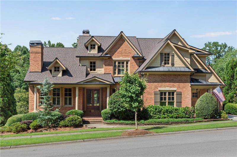 INCREDIBLE VALUE - LISTED $35K Below August 2025 Appraisal! Popular "Brookmoore" plan by Garrell Associates Inc w/primary suite on main situated in the exclusive Sarazen's Corner section of Chateau Elan where all homes comes with an INCLUDED Legends Gold Club Membership! Estate sized 0.828 acre homesite on Duncan Creek - enjoy wooded creek views and winter golf views from your upper deck, lower patio or backyard gazebo! Step into the interior w/FRESH paint, NEW site-finished hardwoods in upstairs halls and NEW carpet upstairs. 10' ceilings & 8' doors on main level. Rocking chair front porch leads to the two-story foyer viewing the formal dining and 11' great room w/stacked stone fireplace & built-ins. Wet bar w/wine rack & space for wine fridge. Private vaulted office/study w/stone fireplace and built-ins. Eat-in Gourmet island kitchen features gas cooking w/pot filler and double ovens. Vaulted keeping with 3rd fireplace featuring stacked stone to ceiling and flanked by built-ins. Pocket office on main w/built-in desk. Plantation shutters in most rooms and Hardwood flooring on ENTIRE main level. Laundry w/mud sink and cabinets. Primary suite on main features access to deck and spa bath w/oversized vanity. Raised loft w/tray ceiling upstairs. Bayed Princess suite w/tray ceiling and private bath featuring tile shower. Additional bedroom w/private bath. Final two bedrooms share a jack & jill bath. Partially finished terrace level w/12' high ceilings and hardwood flooring offers a billiard room, media room, additional flex space and safe room. Plenty of unfinished space for storage or future in-law suite. NEW premium "high definition" roof, NEW HVAC on main, electric vehicle ready in 3rd garage and high end landscape lighting.