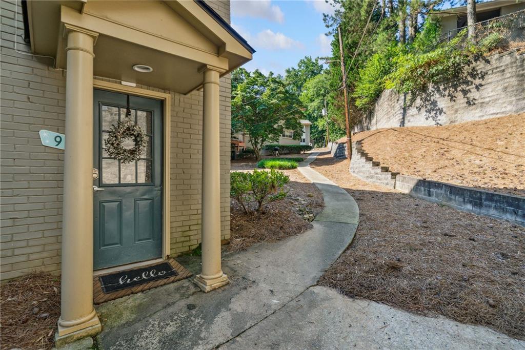 Welcome to this updated and charming condo located just off Briarcliff Road in North Druid Hills. This move-in ready home offers low-maintenance living in a highly sought-after location, just minutes from I-85 with quick access to Emory University, Decatur, Brookhaven, Starbucks, shopping, dining, and more. Inside, the open-concept layout features hardwood and tile flooring throughout, granite countertops, a kitchen island, stainless steel appliances, upgraded recessed lighting, and bright neutral paint. The spacious primary suite includes beautiful barn doors, while the second bedroom is perfect for a home office, studio, or flex space. The tile bathroom features a spacious walk-in shower and a washer and dryer. All appliances are included! Enjoy a private front entry with an outdoor patio, ideal for relaxing during summer and fall evenings. The quiet, gated community also offers a private pool and designated parking spaces, completing this ideal living experience.