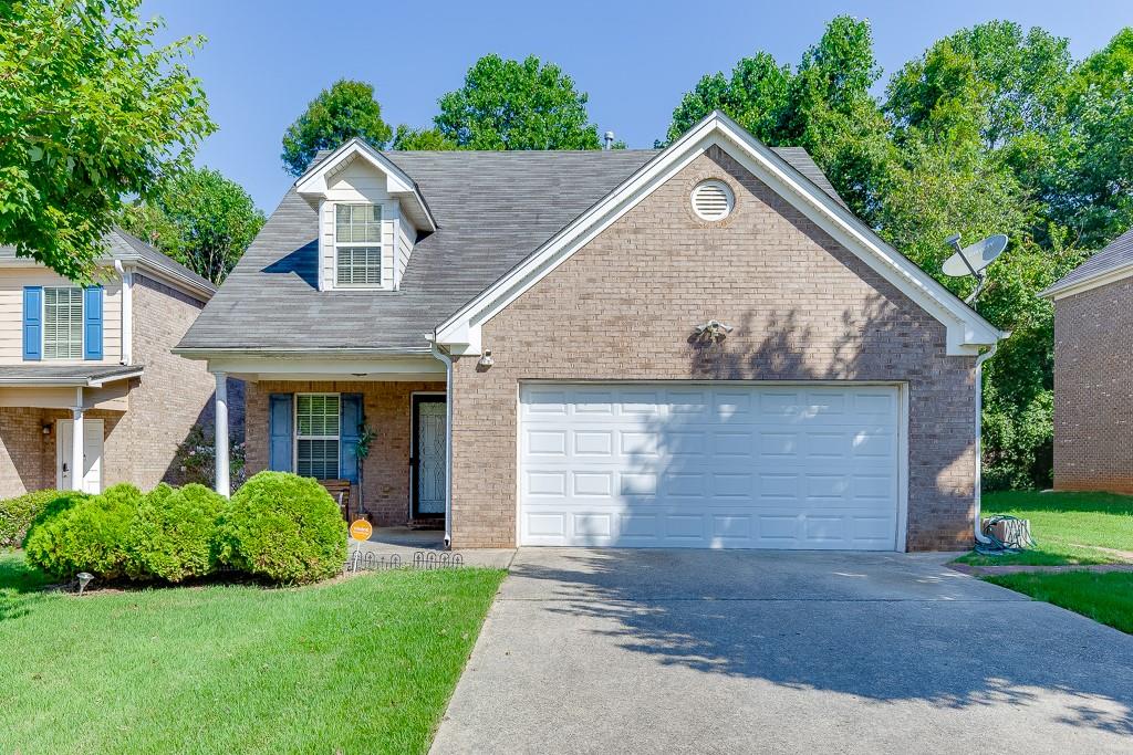 Welcome to this charming 3-bedroom, 2.5-bath home featuring a private backyard! The main level offers an inviting foyer, a spacious family room with a cozy fireplace, an eat-in kitchen, and a convenient half-bath. Upstairs, you'll find a beautifully renovated owner’s suite with a modern bathroom, along with generously sized secondary bedrooms. This home is conveniently located near major interstates and shopping, providing easy access to everything you need!