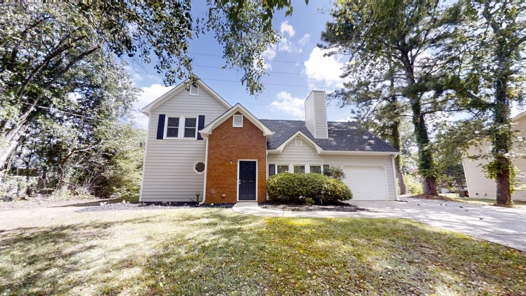 Welcome to this beautifully updated 4-bedroom, 2.5-bath home in the sought-after Steeplechase community! Freshly painted throughout, this home features durable LVP flooring on the main level, tile in the kitchen, and plush carpet upstairs for added comfort. Enjoy the spacious family room with a cozy fireplace and built-in shelving perfect for relaxing or entertaining. The bright and functional kitchen offers plenty of space for meal prep and gathering with family and friends. On the main level, you'll find a large primary suite with an en-suite bath, along with three additional bedrooms upstairs and a versatile bonus area ideal for a home office, playroom, or workout space. Step outside to a rear patio and enjoy the large, private backyard perfect for hosting, playing, or simply relaxing in your own outdoor retreat. Located in a quiet and established neighborhood, this home offers the perfect blend of comfort, space, and convenience. Don't miss the opportunity to make it yours!