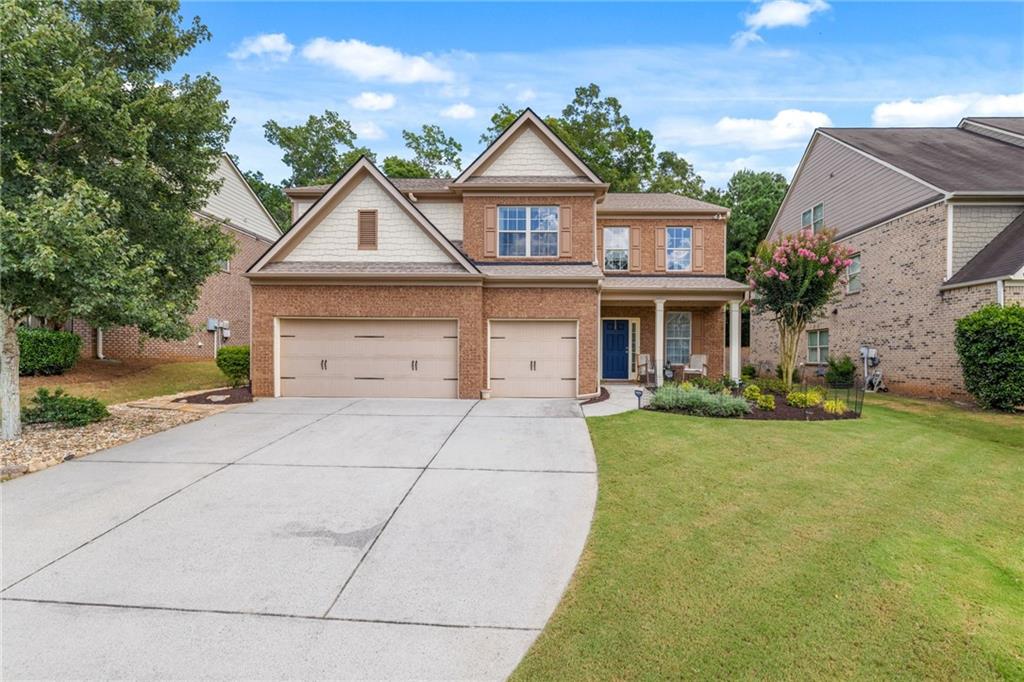 Welcome to this beautifully maintained 5-bedroom, 4-bathroom home located in the highly desirable Champions Run community and zoned for top-rated Lambert High School in Forsyth County.
This spacious two-story home offers a bright, open layout perfect for both everyday living and entertaining. The main level features a two-story vaulted living room, a formal living and dining room, a large eat-in kitchen with granite countertops, and a guest bedroom with full bath — ideal for guests or multigenerational living.
Upstairs, the oversized primary suite includes a spa-like ensuite bathroom and a custom closet system by Closets by Design. Three additional bedrooms and two full bathrooms upstairs — including a convenient Jack-and-Jill bath — provide plenty of space and privacy. The loft area offers a flexible second living space, perfect for a media room, office, or playroom.
Additional upgrades include:
Closets by Design systems in the primary suite, main-level bedroom, and mudroom
Roof and HVAC less than 3 years old
Microwave and stove less than 2 years old
Enjoy a private, wooded backyard with an expanded patio, perfect for outdoor entertaining. The large driveway leads to a 3-car garage, offering ample parking and storage.
Located in a vibrant swim/tennis community with excellent amenities and minutes from shopping, dining, and parks.
Don’t miss this exceptional home! Champions Run | Forsyth County Schools | Lambert High School District